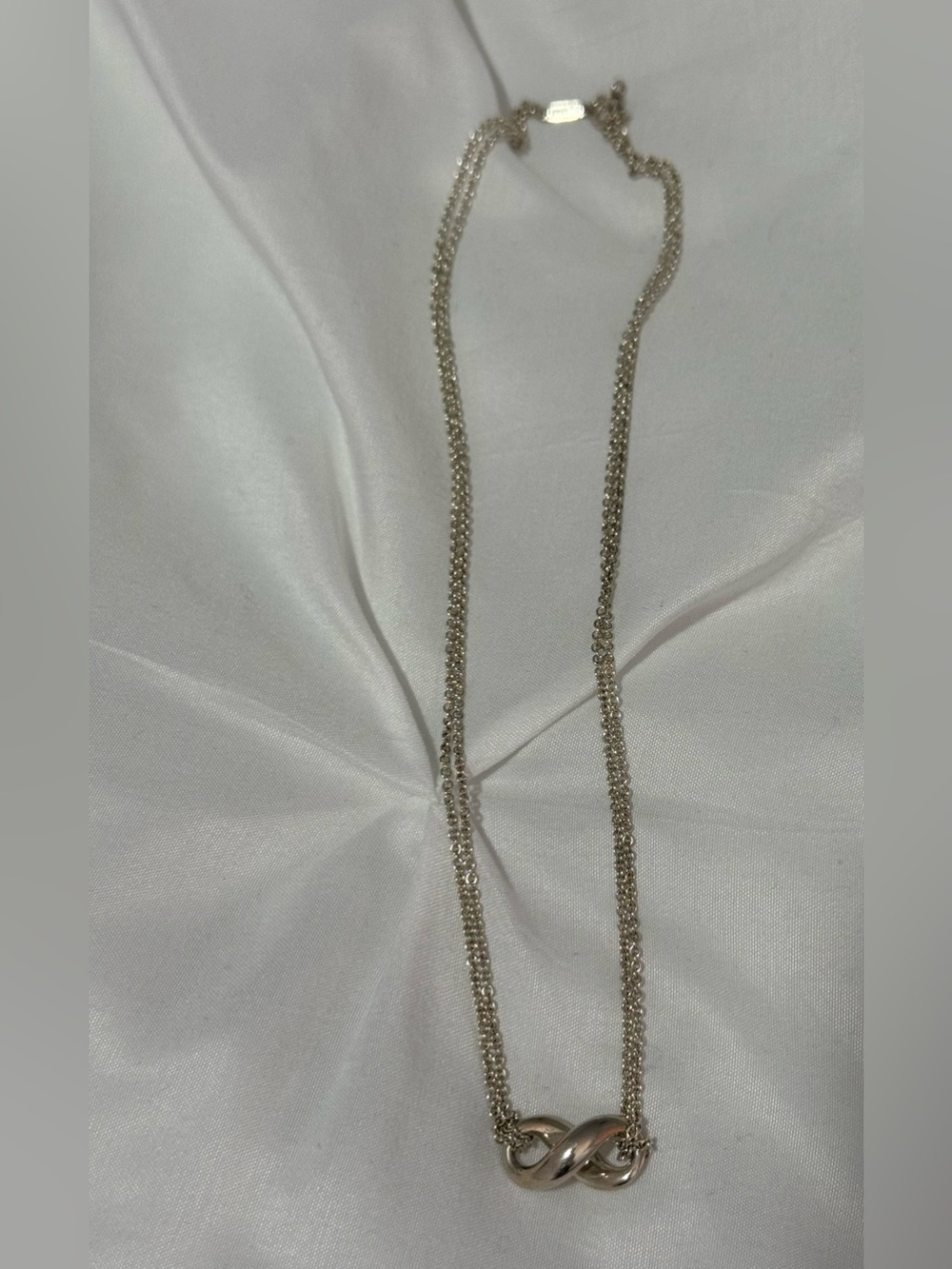 Tiffany & Co. Infinity collection Silver Interlocking Knot Necklace